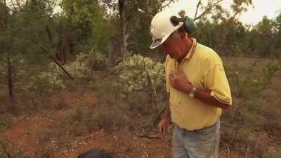 Frustrated with Al's old-school
dowsing technique, - Outback Opal Hunters