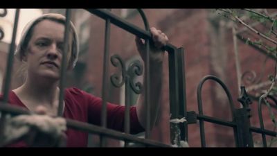 [gate opens silently] - The Handmaid's Tale