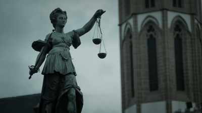 [gavel pounds] - Eyewitness