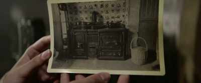 Gef, with his eye to
the door's peephole, - Nandor Fodor and the Talking Mongoose