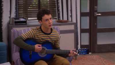 [gentle guitar music playing] - That Girl Lay Lay