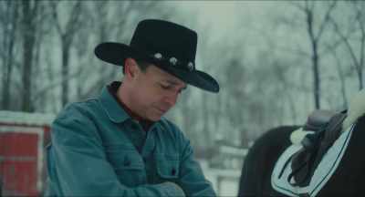 [gentle poignant music] - Christmas Cowboy