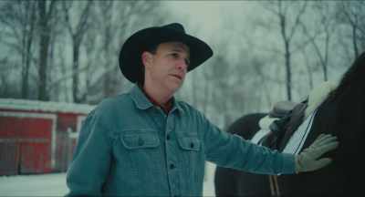 [gentle poignant music] - Christmas Cowboy