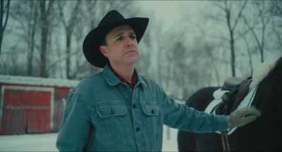 [gentle poignant music] - Christmas Cowboy
