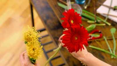 Gerbera could add nice texture, - When Love Blooms