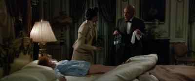 Get her nightgown
behind the bathroom door. - Annie
