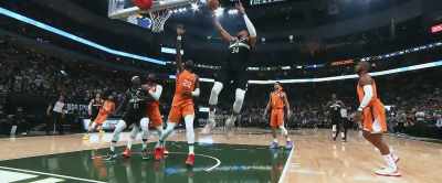 Giannis down the...
he banks it home. - Giannis: The Marvelous Journey