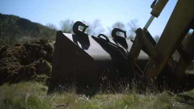 Gina: Eventually,
that backhoe - Buried In The Backyard
