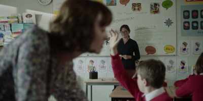 GIRL: Miss!
- SCHOOL BELL RINGS - Maxine
