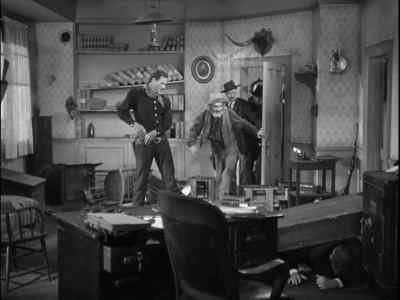 Give me a hand here, boys. - Tall in the Saddle