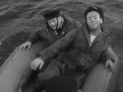 Give the ruddy Tirpitz an
extra kick from us? - Above Us the Waves
