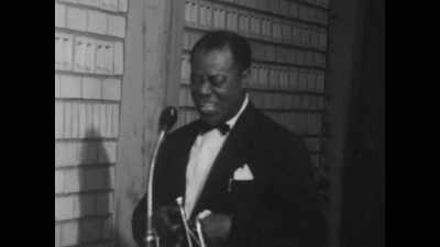 Glad to see you around
and dig the concerts. - Louis Armstrong's Black & Blues
