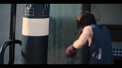 [gloves hitting punching bag] - The L Word: Generation Q