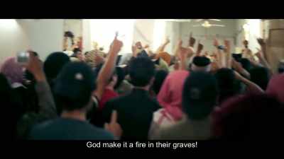 God, make it a fire
in their graves! - City of Ghosts