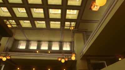 Golden light streams in
through coloured glass - Frank Lloyd Wright: The Man Who Built America
