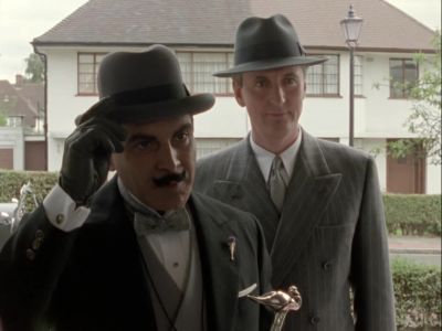 Good evening.
We wish to see a M. Shaw. - Agatha Christie's Poirot