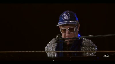 ("Goodbye Yellow Brick Road" plays) - Elton John Live: Farewell from Dodger Stadium