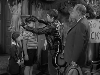 Got a present for you, pal. There you go. - The Addams Family
