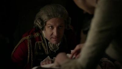 Governor Tryon, talk to him.
Distract him from the pain. - Outlander