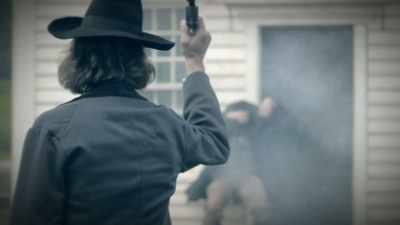 Grimes was shot five times
and falls dead. - Beyond Oak Island