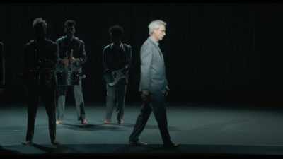 - (GROANS AND SUBDUED LAUGHTER)
- OK. - David Byrne's American Utopia