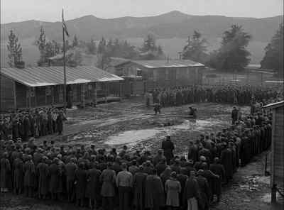 GUARD:
Attention! The kommandant. - Stalag 17