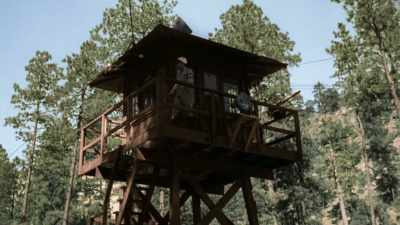 GUARD TOWERS WITH ARMED PATROLS
PROTECT THE CAMP. - America in Color