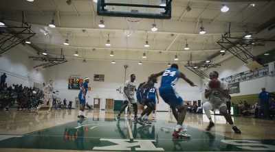 Hampton drives baseline
through the contact. - Last Chance U: Basketball