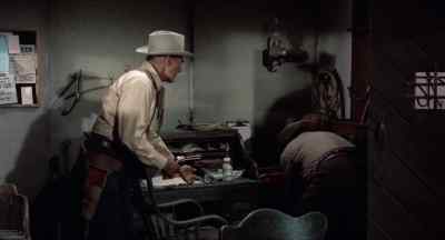 Hand me my gun belt. - Buchanan Rides Alone