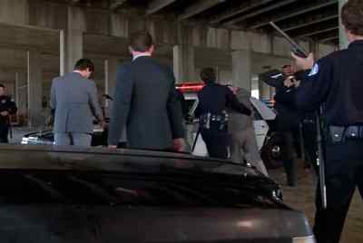 Hands on the car! All right,
spread them! Come on. - Moonlighting