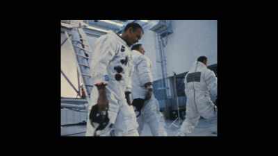 HARRISON (VO):
"We were a congenial bunch - Armstrong