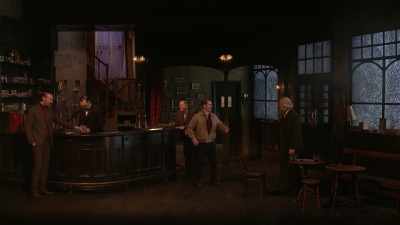 Harry says to Inspector
'What time are ya due int' office?' - National Theatre Live: Hangmen