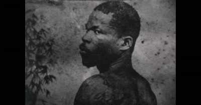 He was a criminal.
I think he stabbed a prison officer - Into the Inferno