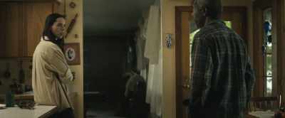 He had a woman with him. - The Night House