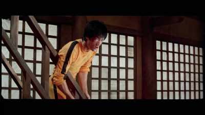 'He briefly stops as he descends,
and reacts to something. - The Final Game of Death