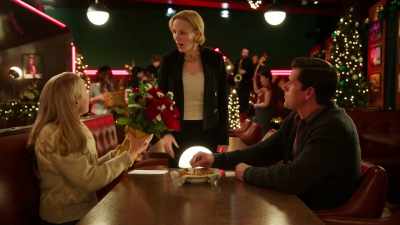 He can afford gorgeous flowers, - A Carol for Two