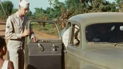 HE CAN'T
UNTIL AMERICANS TAKE BACK GUAM. - The Pacific War in Color