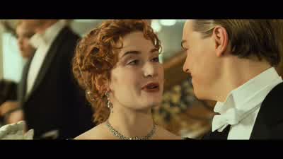 He comes home drunk as a pig celebrating and lights a fire. - Titanic