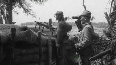 HE DELIVERS A MESSAGE
TO HIS TROOPS. - The Pacific War in Color