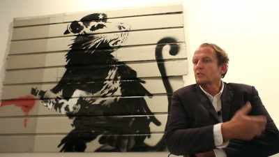 He doesn't necessarily agree
with how it works. - Saving Banksy