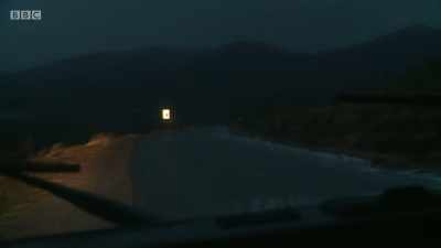 He drives back down the
ice-covered road - The Mountain