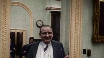 HE FALLS INTO THE GRIP
OF ALCOHOLISM, - America in Color