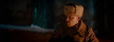 He grabs his machine gun, - The Red Ghost