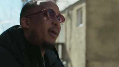 He was holding a Walkman,
and the first thing he did - The Slow Hustle