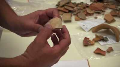 He identifies the fragment
of a pot from its shape. - Dead Sea Scrolls: The Doomsday Prophecy