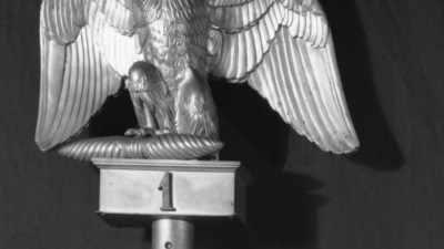 He looked up at the bronze
eagle finial and said, - History's Greatest Heists with Pierce Brosnan