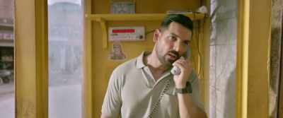 He is lying to his wife as well. - Parmanu: The Story of Pokhran