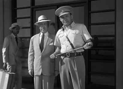 He ought to be along soon
if he intends to catch that plane. - Affair in Trinidad