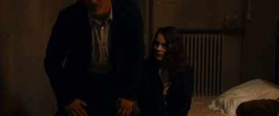 He said she sat beside him on the bed,
exhausted, - Transit