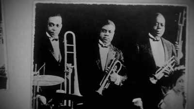 He says,
"But as long as I keep him with me, - Louis Armstrong's Black & Blues
